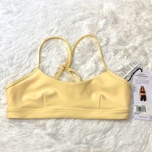 Women’s Alo Yoga Intrigue Sports Bra. NWT Size XSmall. Color: French Vanilla